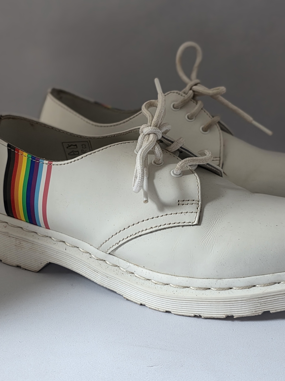 Dr. Martens White Leather Lace-Up Oxfords with Rainbow Heel Stripe